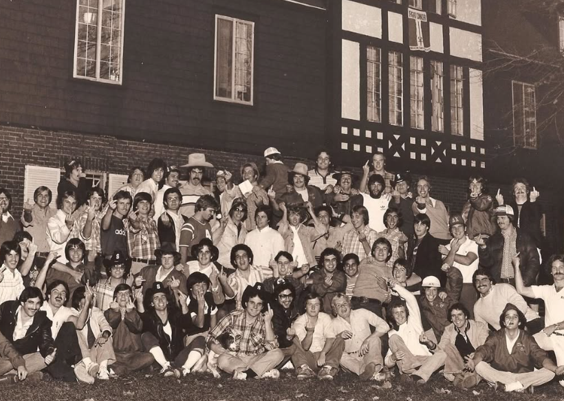 A historic Delta Chi chapter group outside the house